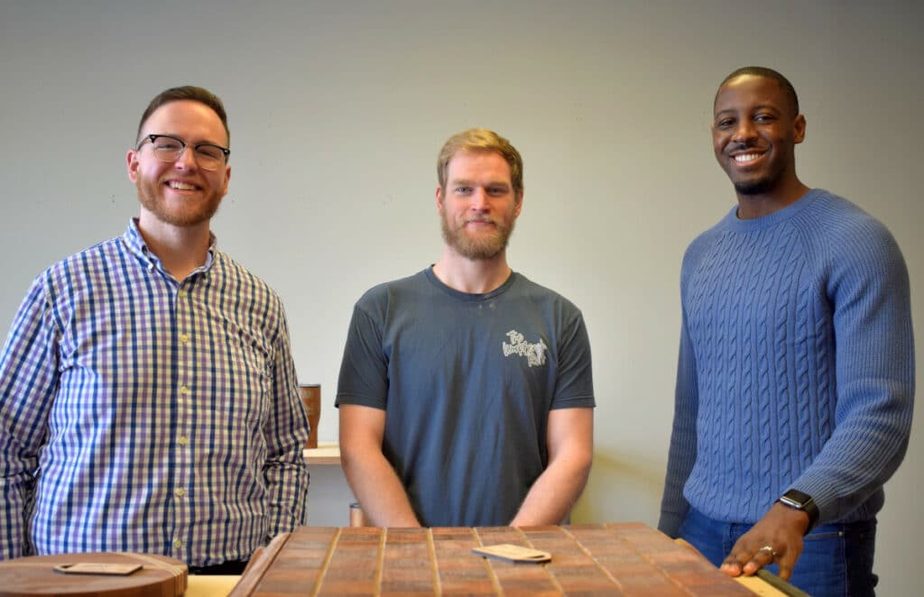 SBDC Business Analyst Brandon Hennessey, Rudd, and Capital Region SBDC executive director Rodney Williams 